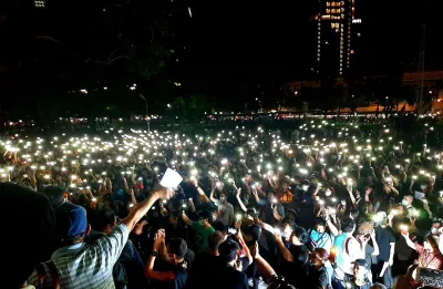 Students light their mobile phones during a protest against the government at Kasetsart University on February 29, 2020. Photo by Chonthicha Jangrew. image linking to Thai student protesters in the time of COVID-19: New generation, new forms of resistance online